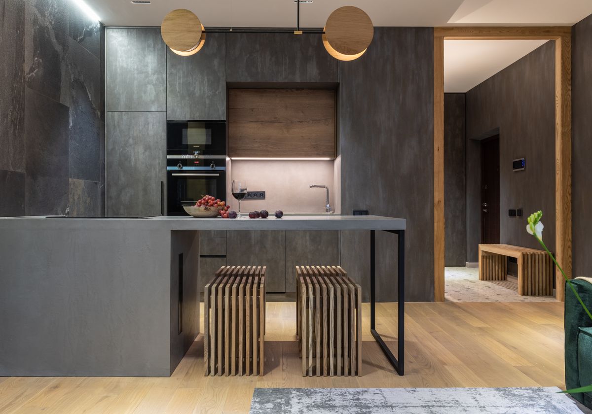 Fluted timber island in a dark kitchen