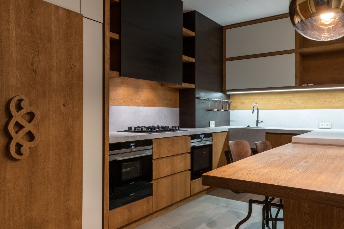 Kitchen with carved decorative timber panel